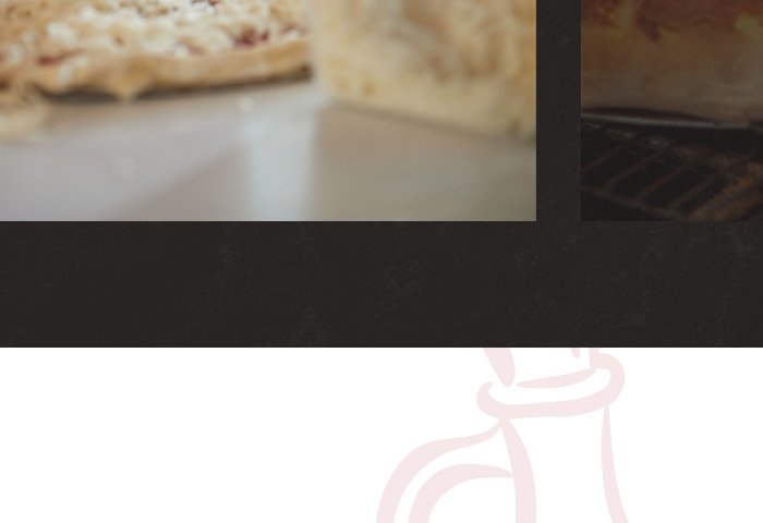 Pizza going into the oven
